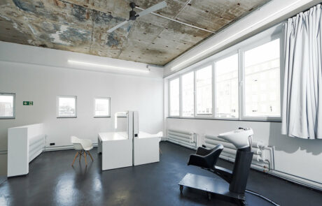 raw studios. hair makeup tables and hair washing station