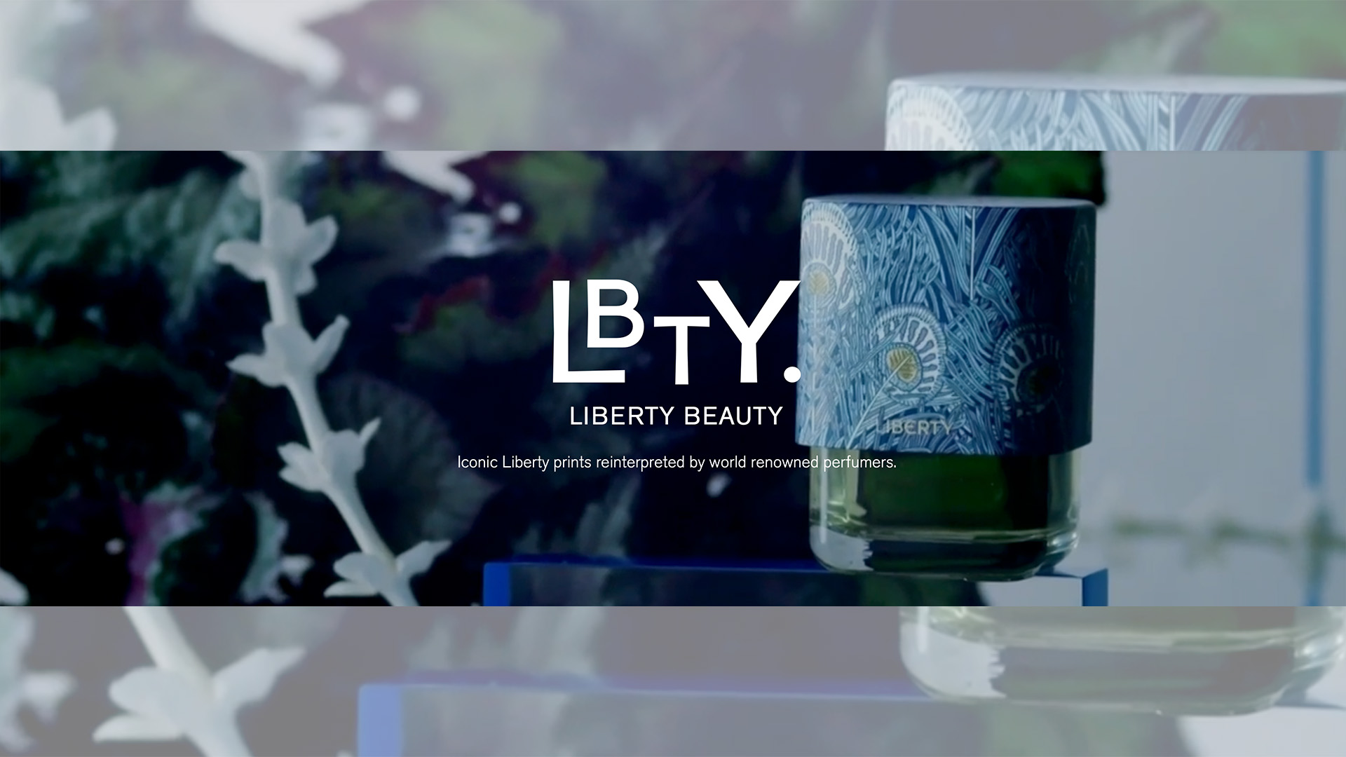 A campaign image featuring the Liberty LBTY fragrance collection