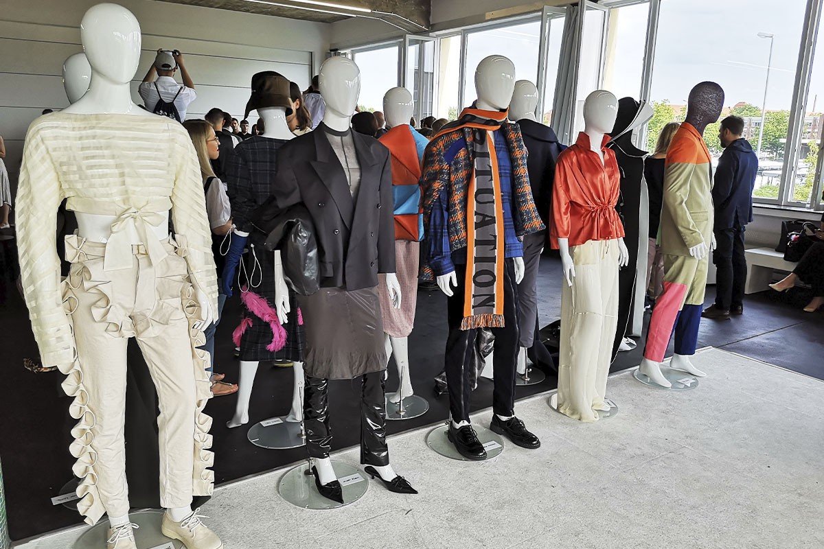 A closer view of the FASH Award 2018 exhibition at raw studios., where mannequins dressed in innovative, high-fashion designs stand against a modern, industrial backdrop, showcasing cutting-edge craftsmanship.