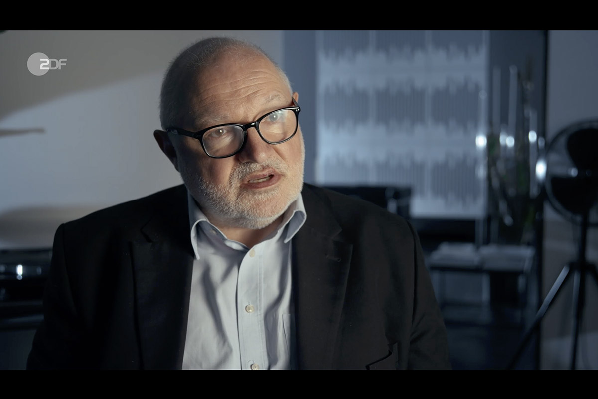 Interview shot of Michael Sell, in a contemporary studio setting for the Cum-Ex documentary.